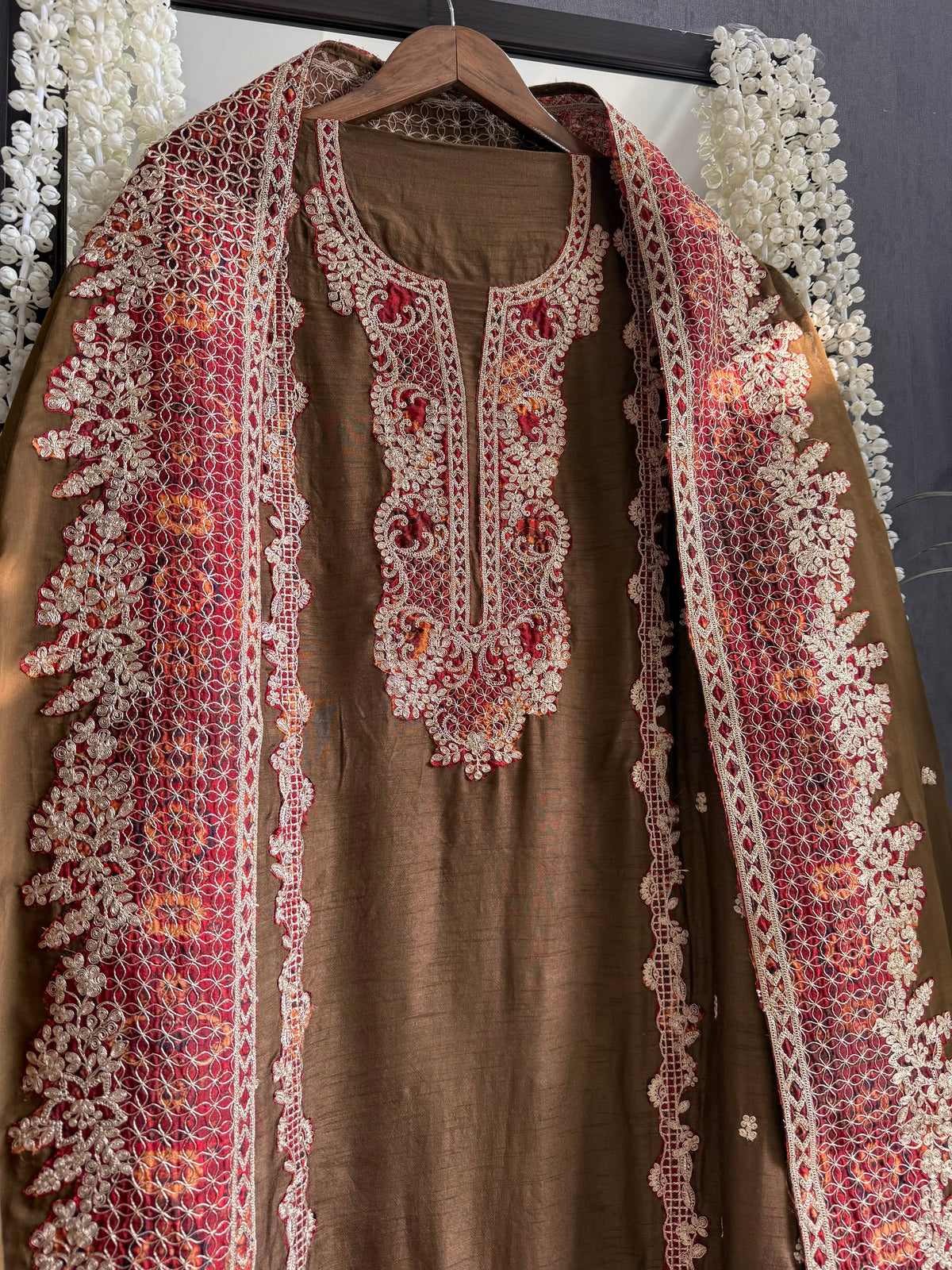 Luxurious raw silk aari work suit