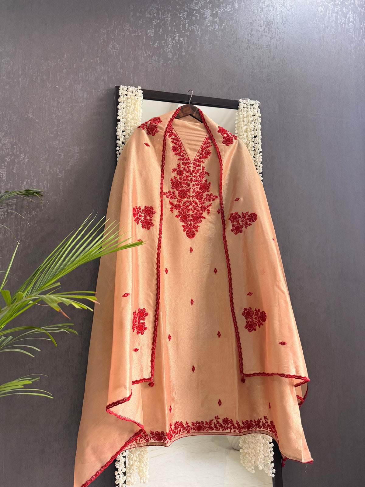 Luxurious ruby bejewelled suit