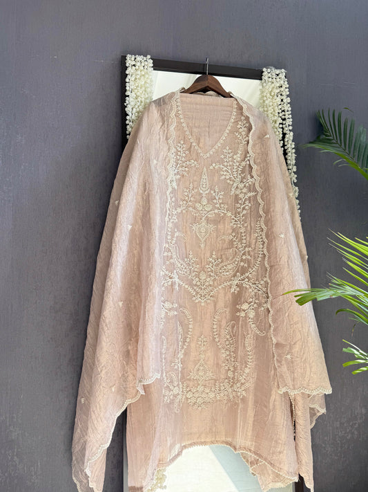 Luxurious crush tissue aari work pearl suit