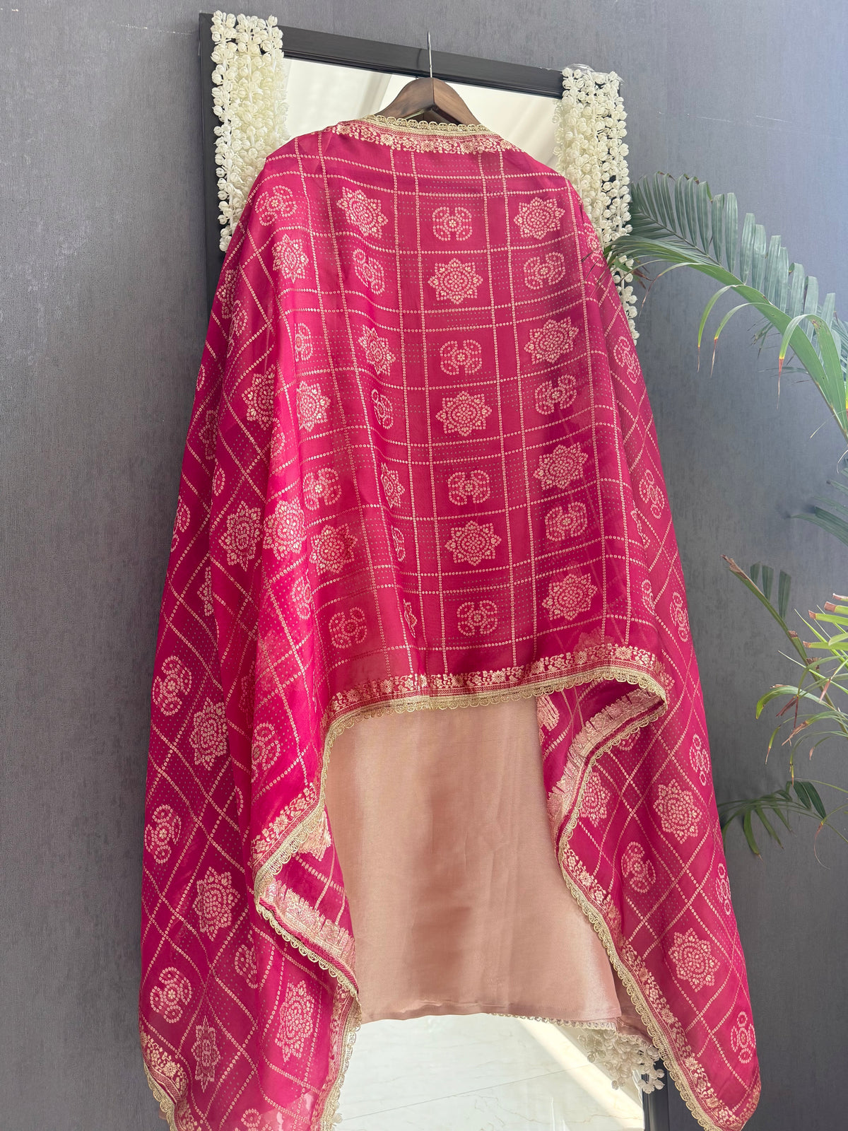 Luxurious bejewelled Gharchola suit