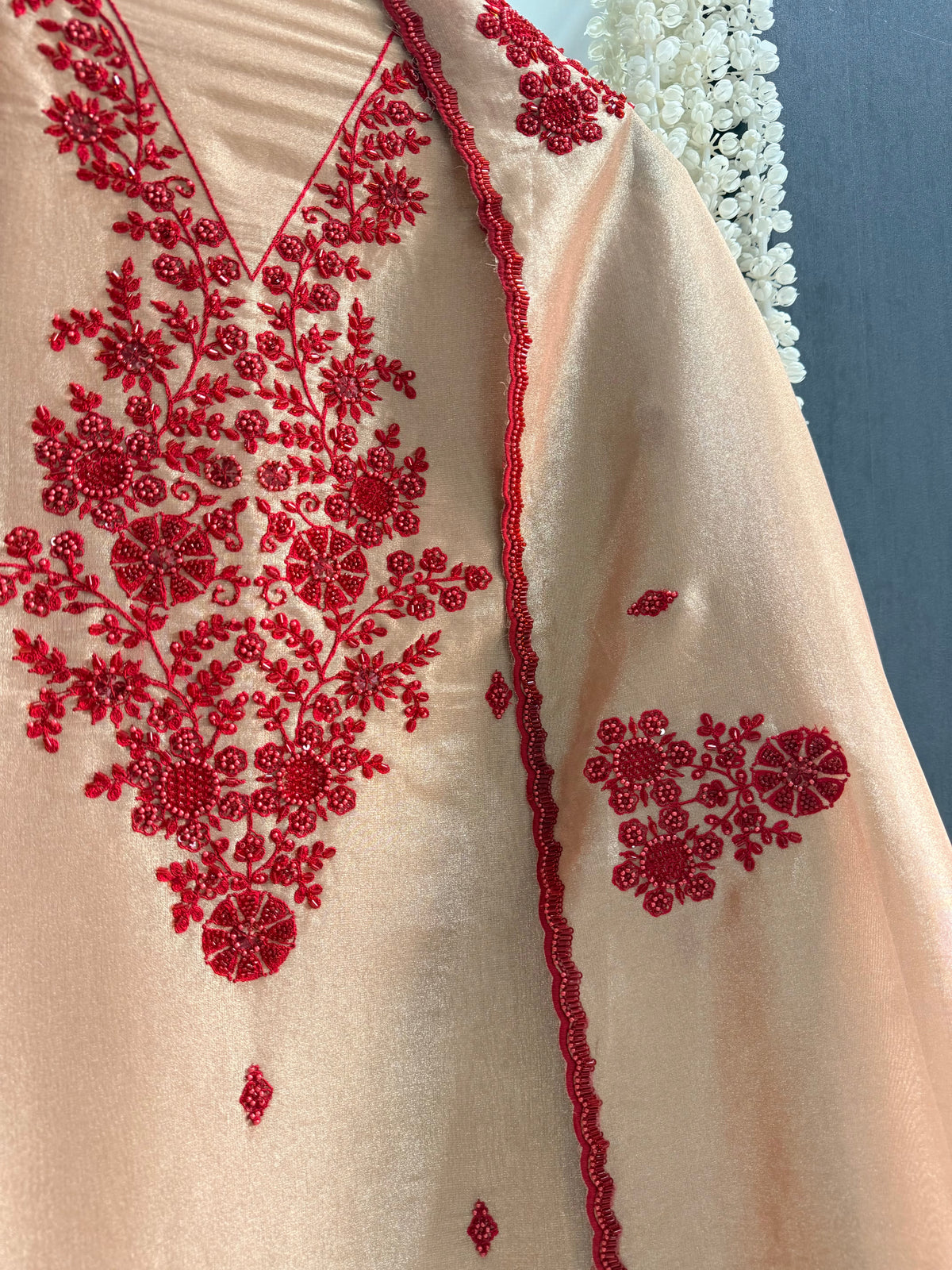 Luxurious ruby bejewelled suit