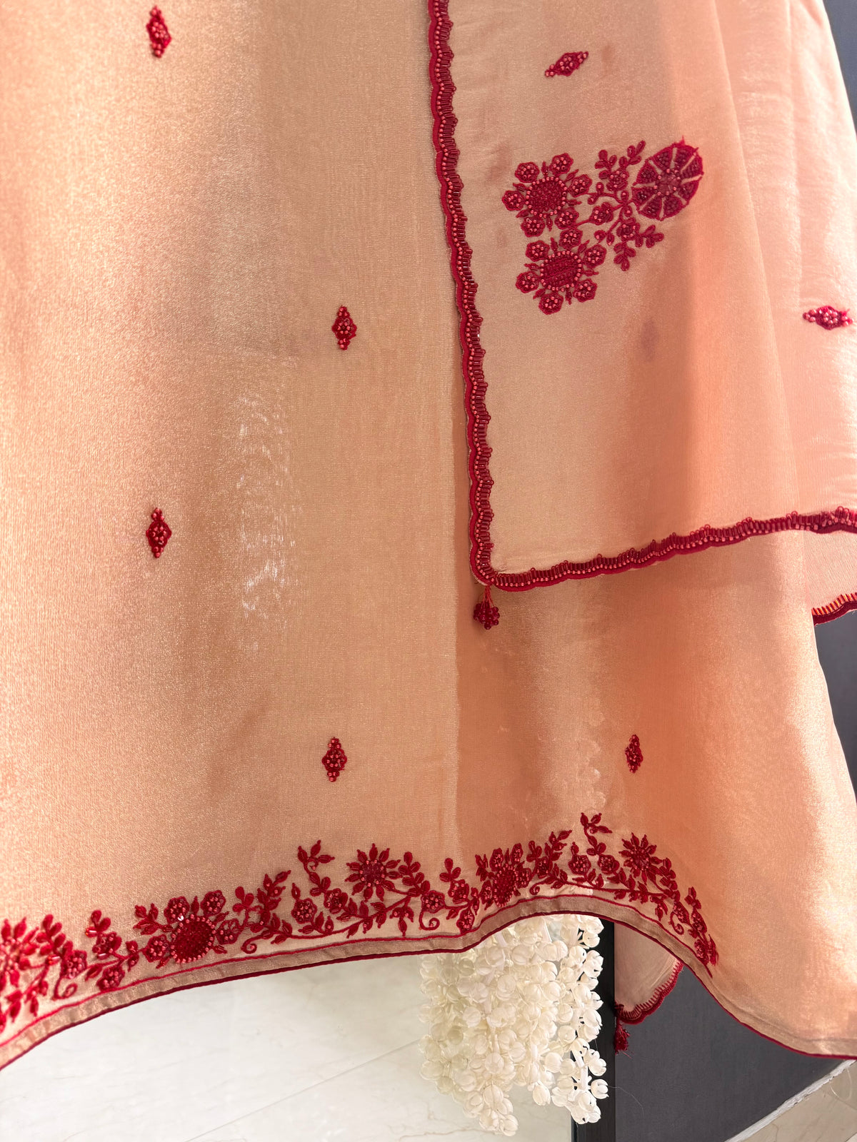 Luxurious ruby bejewelled suit