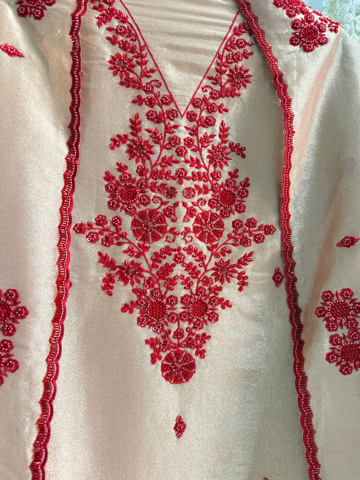 Luxurious ruby bejewelled suit