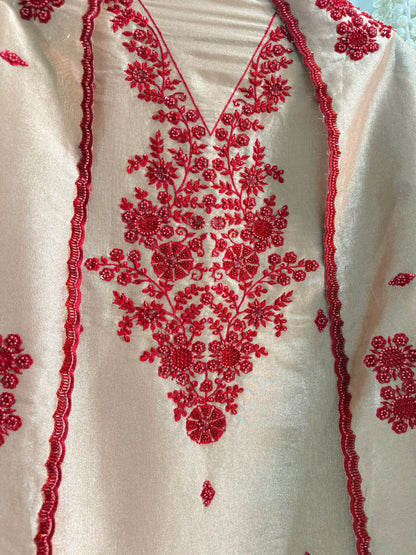 Luxurious ruby bejewelled suit