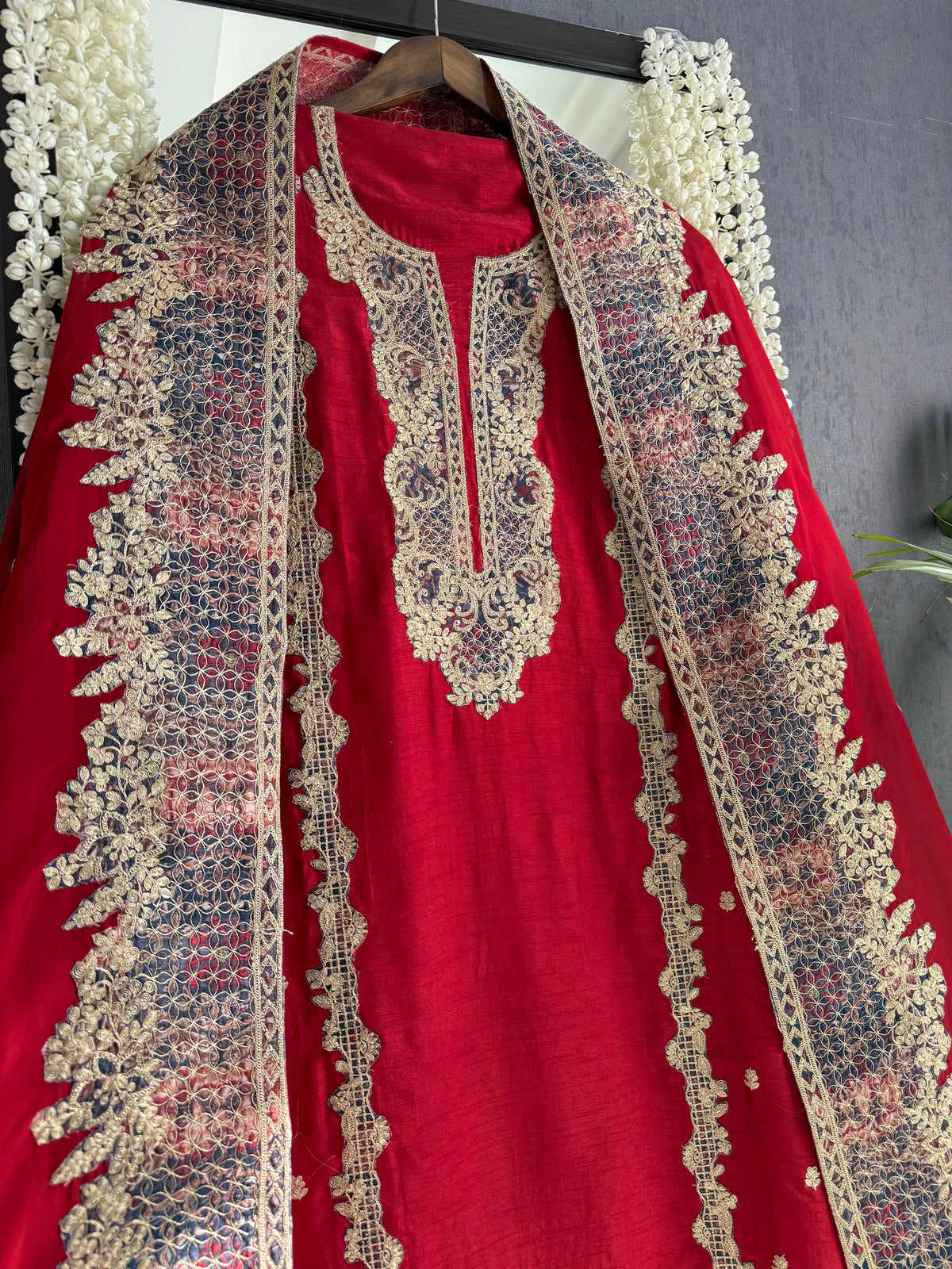 Luxurious raw silk aari work suit
