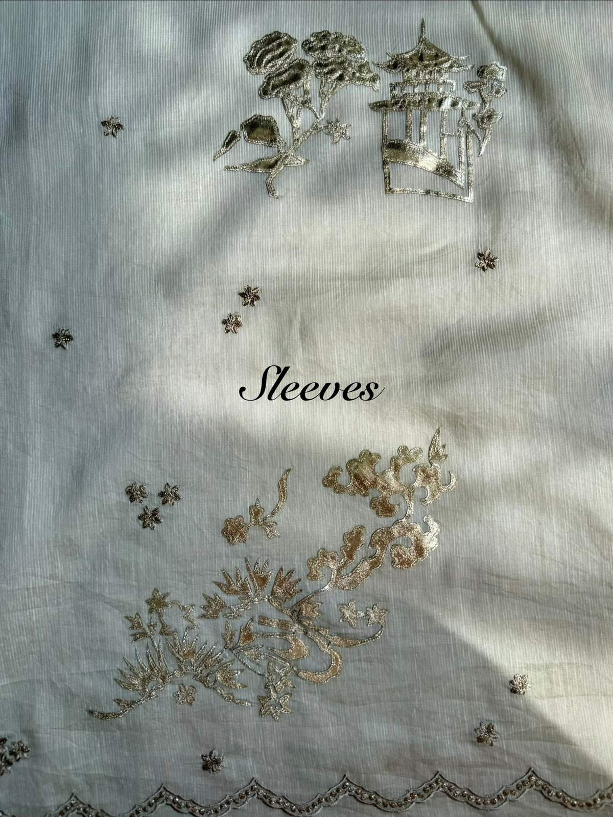 Luxurious Mul chanderi gota appliqué work suit