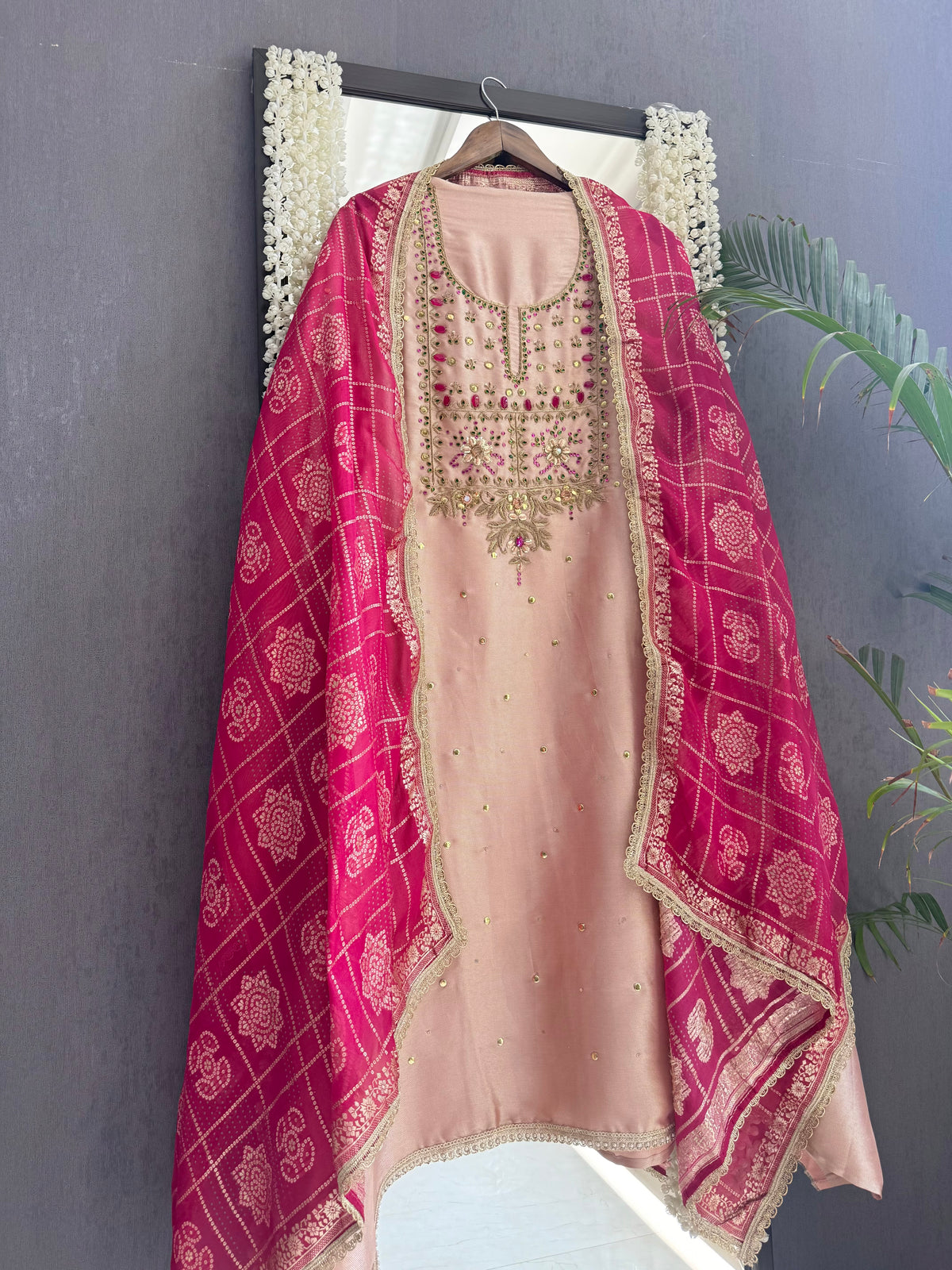Luxurious bejewelled Gharchola suit
