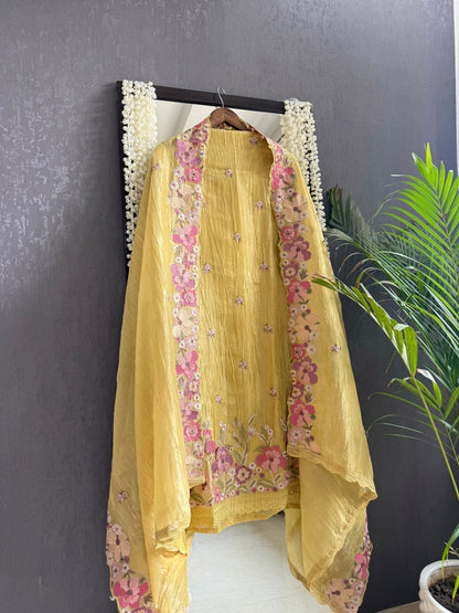 Luxurious Mul chanderi appliqué work floral suit