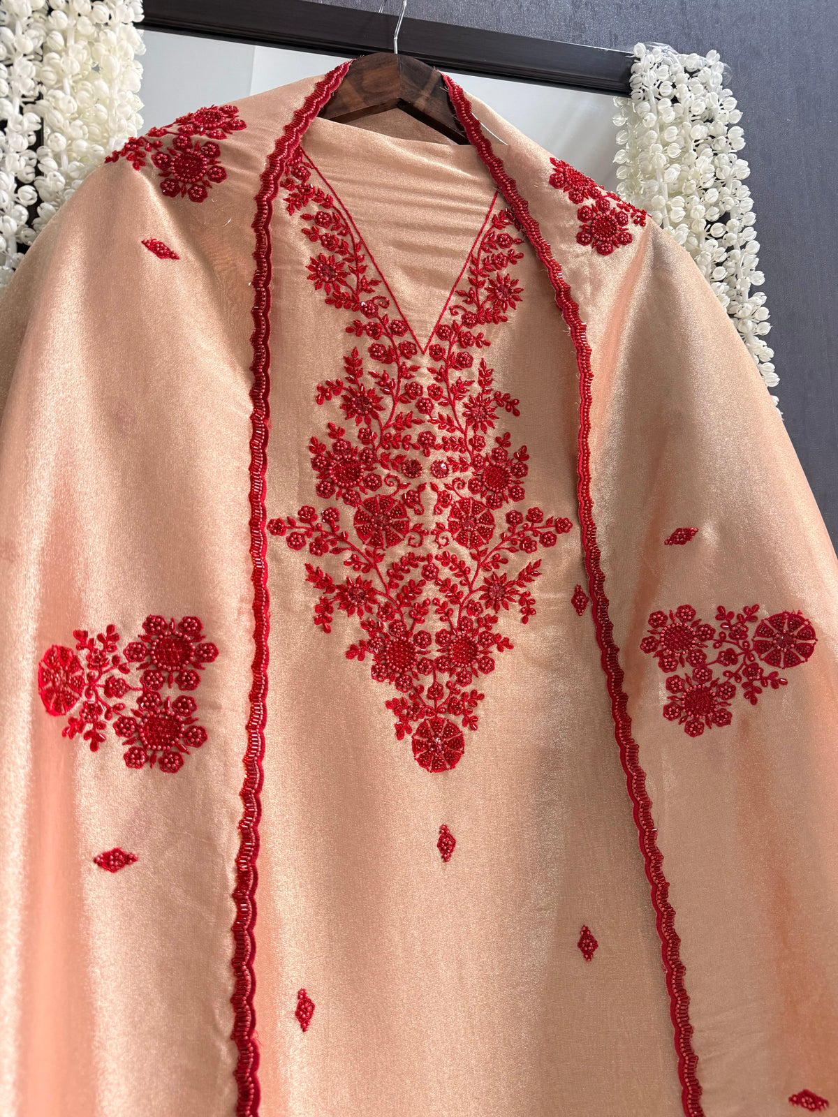 Luxurious ruby bejewelled suit